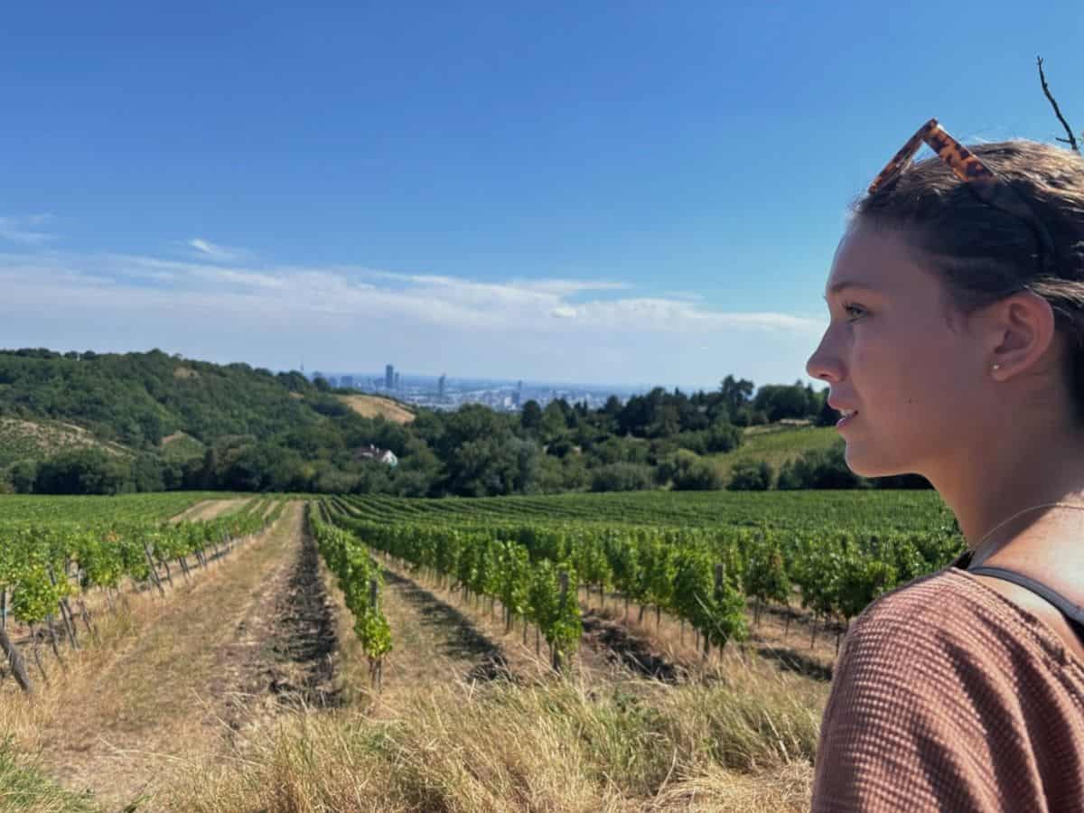 Zoey enjoying views of Vienna on a vineyard hike