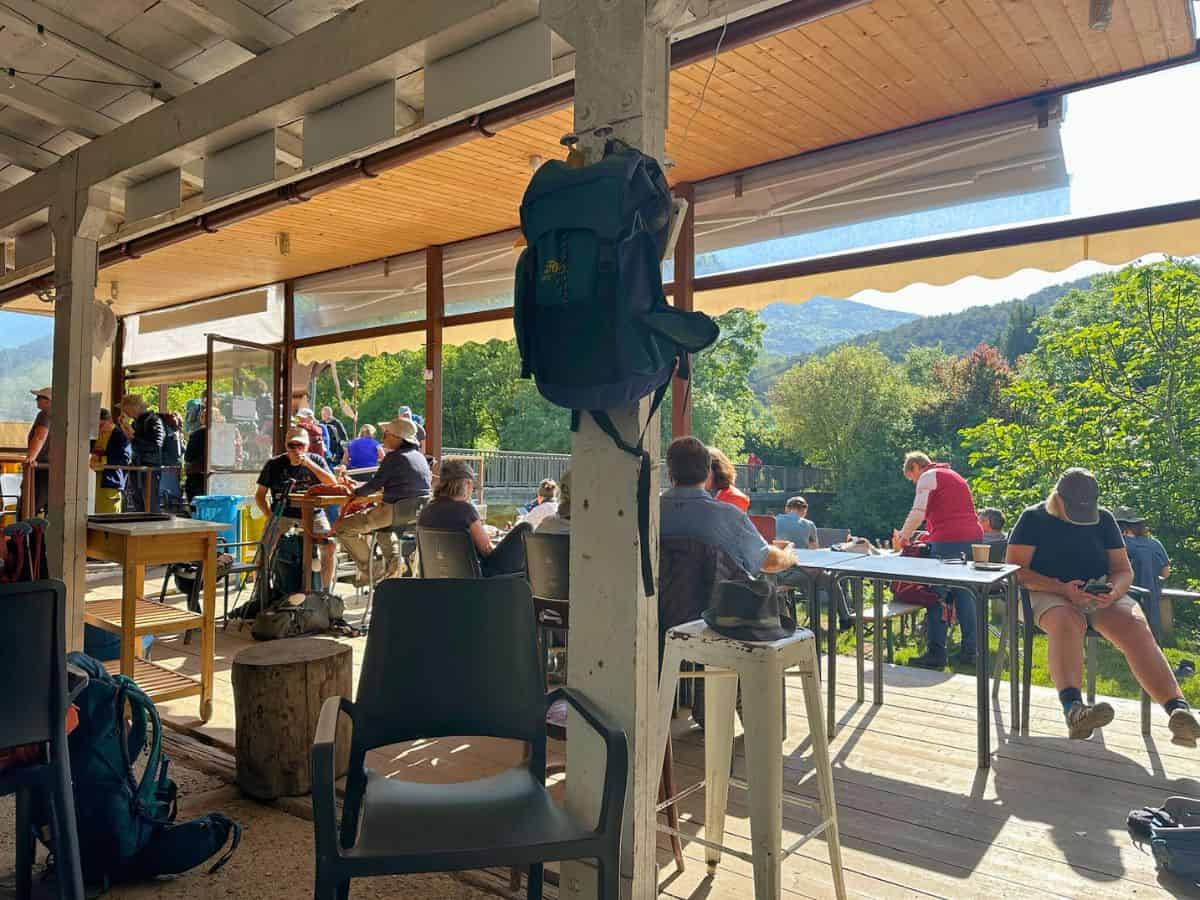 Fellow pilgrims enjoying breakfast and a rest communally along The Way. Community along the trail is one of the best bonus reasons to walk the Camino.