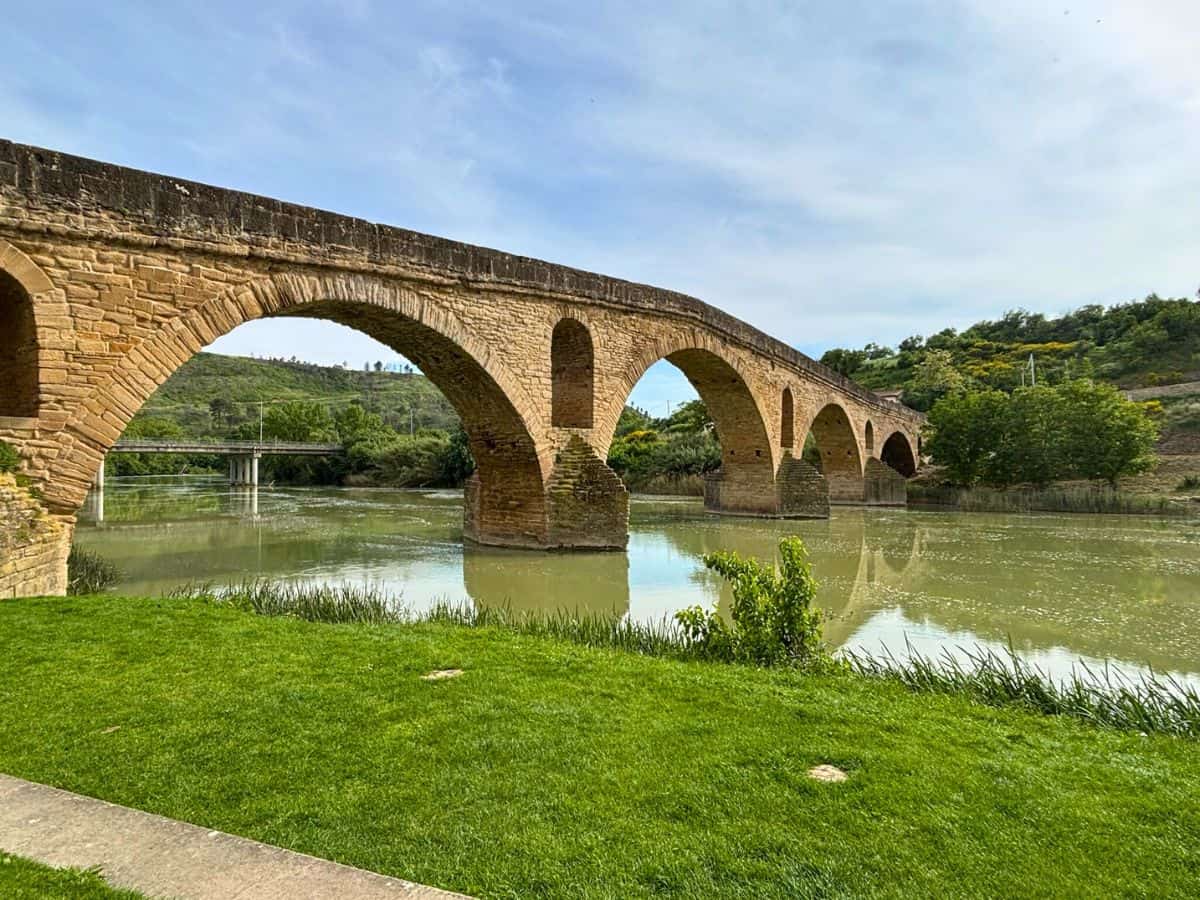 The Camino Francés crosses this 11th century Romanesque bridge in Puente la Reina. Experiencing history is a key reason to walk the camino.