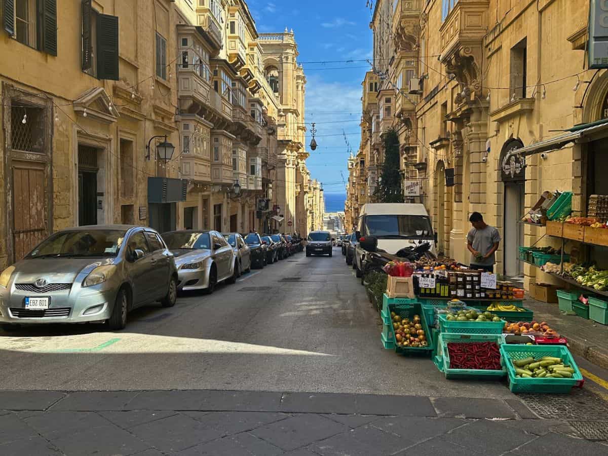 Cars lining the street in Valletta, Malta