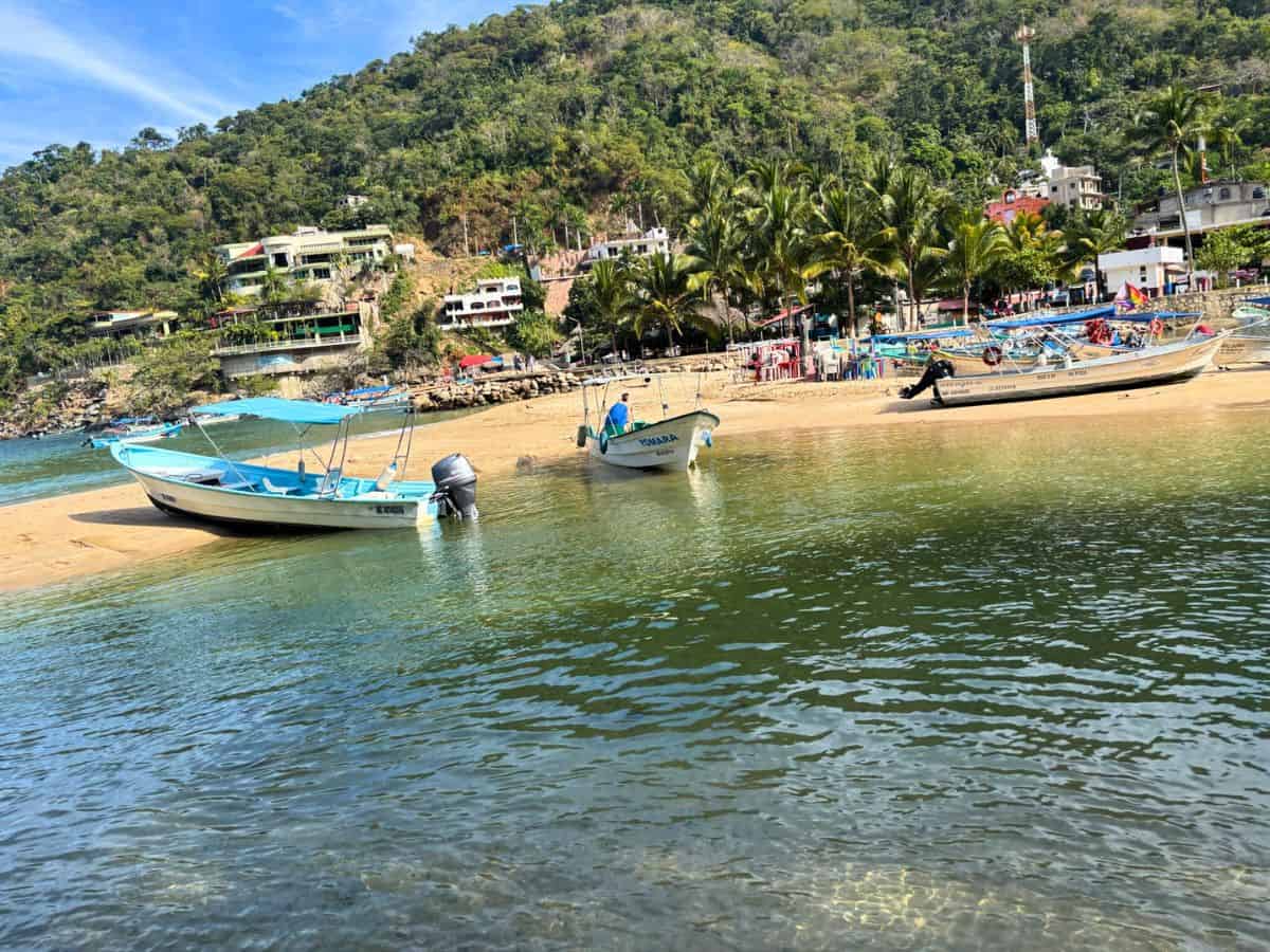 Boats ashore at Boca de Tomatlán - a popular launching off point for visiting Banderas Bay beaches to the south 