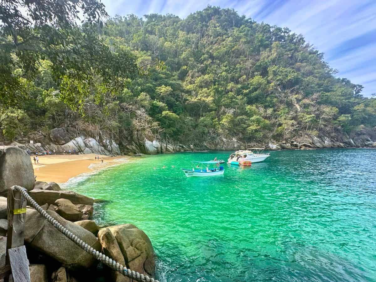 Beautiful emerald waters at Playa Colomitos, one of the Banderas Bay beaches reachable by hike